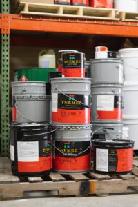 gallons of epoxy solution to be used for floor repair in Kansas City