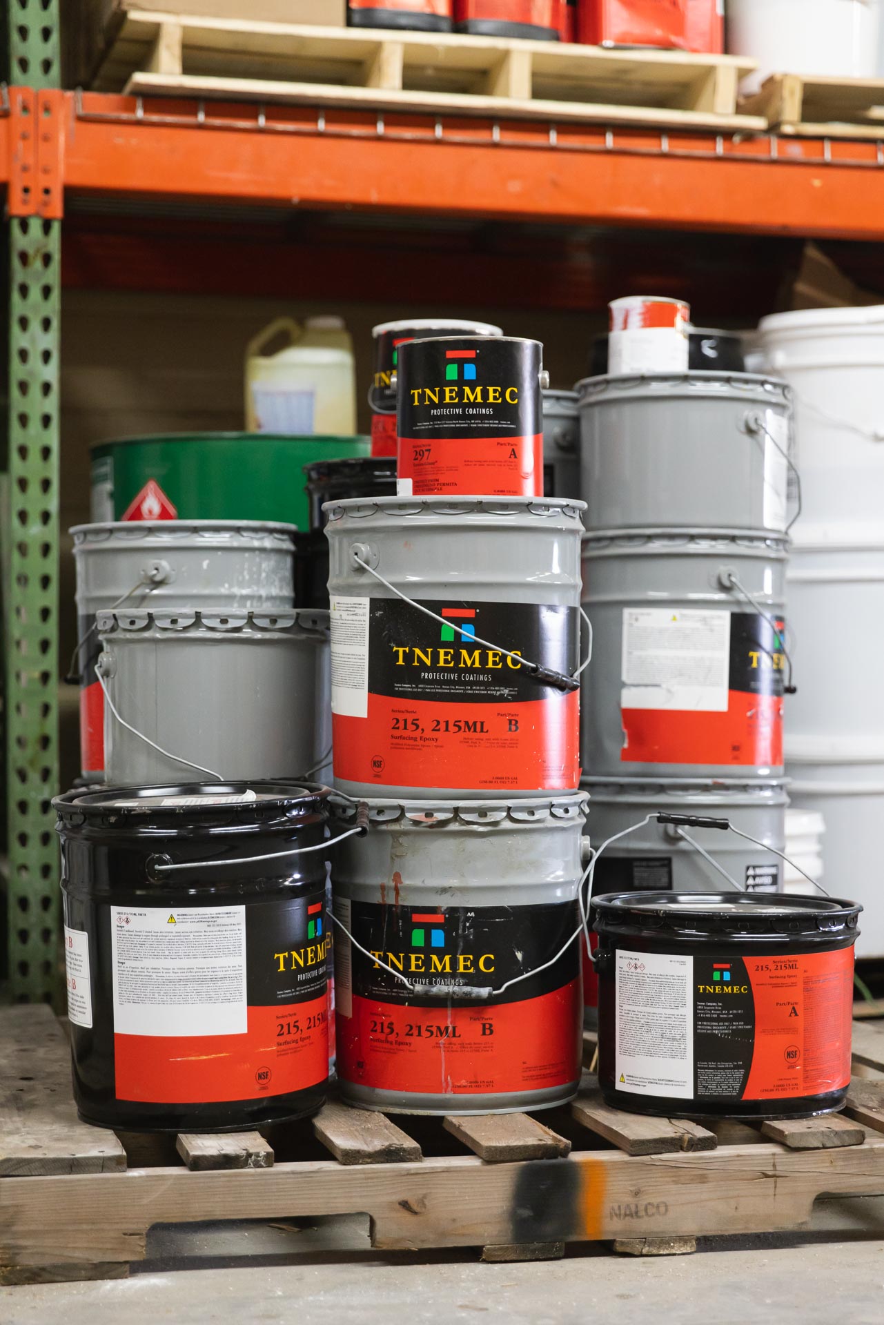 gallons of epoxy resin solutions to be used for floor repair in Kansas City
