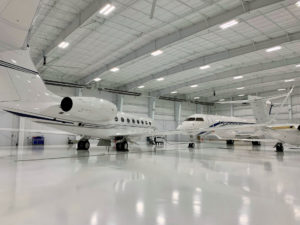 epoxy floor coating in an airplane display hangar